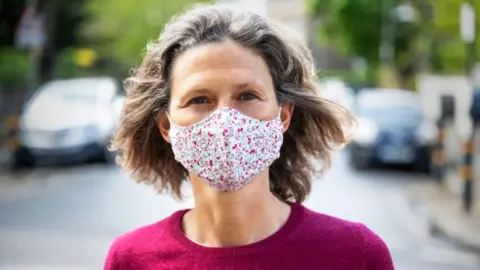 Getty Images woman wearing face mask