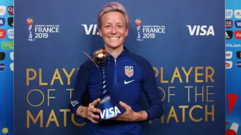 Getty Images Megan Rapinoe of the USA poses for a photo with her VISA Player of the match award after the 2019 FIFA Women's World Cup France Round Of 16 match between Spain and USA