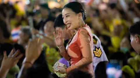 Getty Images Princess Bajrakitiyabha greets royalist supporters outside the Grand Palace in Bangkok on November 1, 2020 in Bangkok.