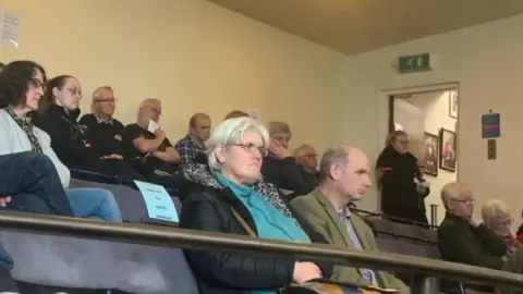 Carmelo Garcia Dozens of residents in the public gallery at Municipal Officers, Cheltenham