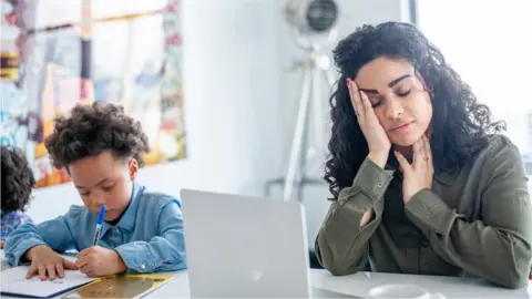 Getty Images Mum looking stressed