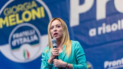 Getty Images Giorgia Meloni of Fratelli d'Italia political party, member of right-wing coalition speaks to supporters in turin, Italy.