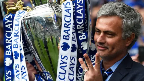 Jose Mourinho celebrates winning the Premier League with Chelsea