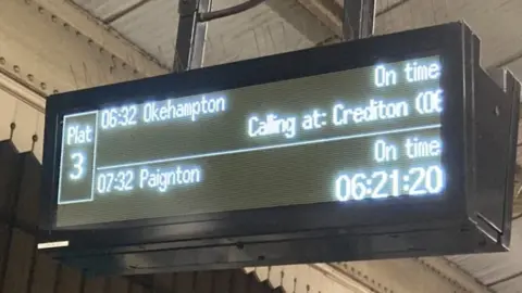 Hamish Marshall Train time board at Exeter Station