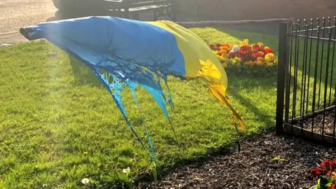 Paul Blay Ukraine flag burnt in act of vandalism