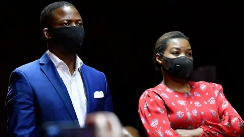 Getty Images Shepherd Bushiri and his wife Mary appear at Pretoria Magistrate's Court on November 04, 2020 in Pretoria, South Africa.