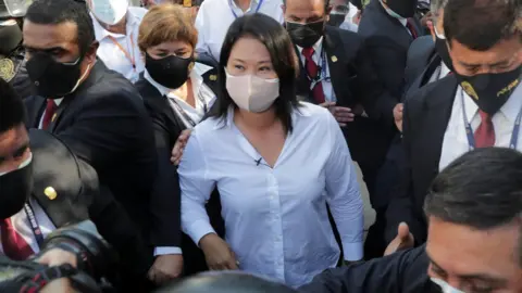 Reuters Presidential candidate Keiko Fujimori leaves the polling station after voting