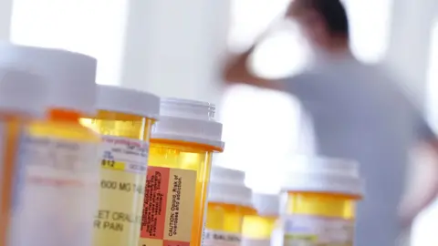 Getty Images Stock image of a row of tablet bottles