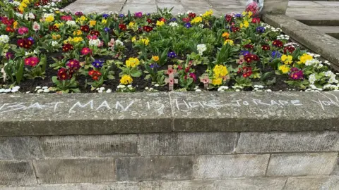 Jessica Offensive messaged chalked on wall