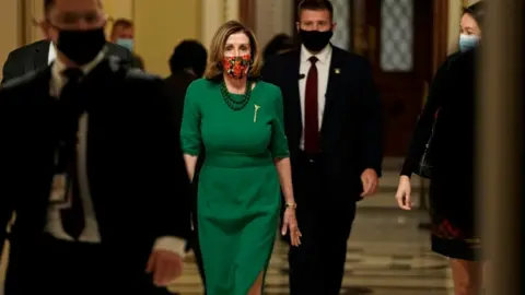 Reuters Nancy Pelosi (C) - 24 December