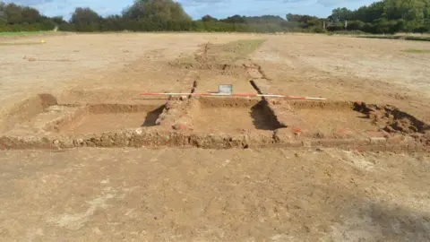 Oxford Archaeology East Brick foundations of the best preserved building on the site