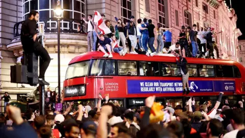 Reuters Fans gather for England v Denmark - Piccadilly Circus