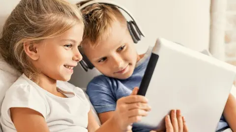 Getty Images Children using a tablet