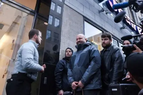 Getty Images The queue outside a cannabis store in Canada