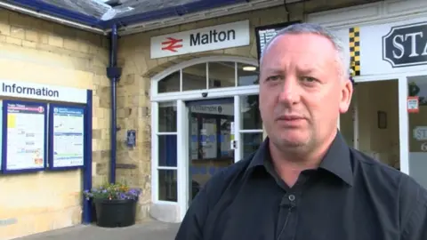 Mr Frank outside Malton station