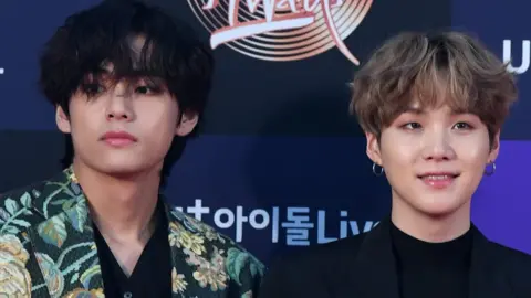 Getty Images V and Suga from BTS
