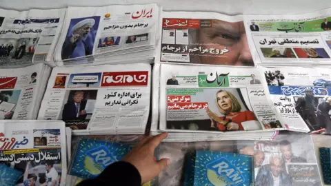 EPA Iranian daily newspapers react to US President Donald Trump's decision to abandon the Iran nuclear deal (9 May 2018)