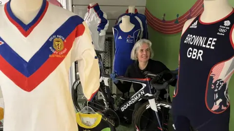Leeds Museums and Galleries Curator with items on display