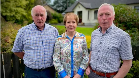 Paul McKearney, Marian McCann, Jim McKearney