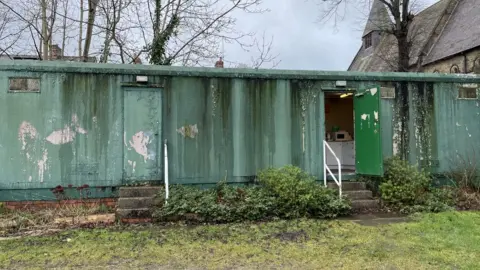 Simon Thake/BBC The mouldy clubhouse
