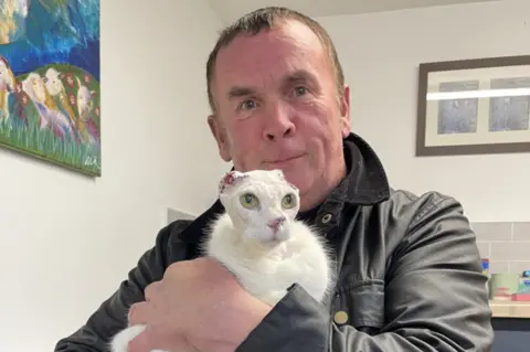 Brinsley Animal Rescue Dave Whitehouse with the cat