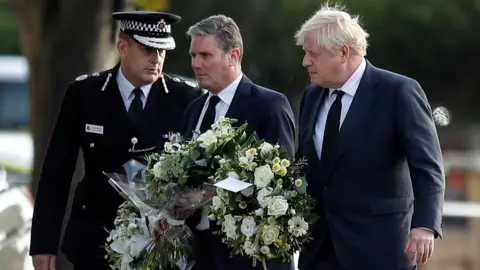 Reuters Essex Chief Constable BJ Harrington, Sir Keir Starmer and Boris Johnson outside the church in Leigh-on-Sea in Essex on Saturday