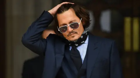 EPA/NEIL HALL Johnny Depp at London's High Court on 14 July