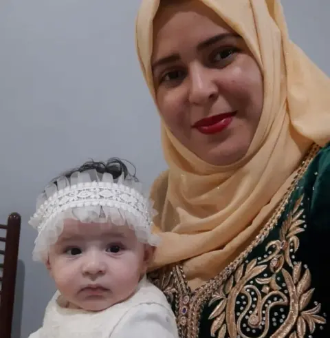 Abdel Meslem Adra with her mother, Souad