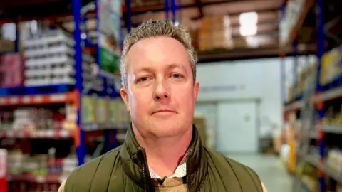 Martin Giles/BBC Matt Hammond at Savoy Foods warehouse