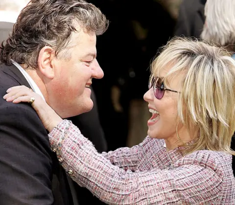 Getty Images Robbie Coltrane with Scottish singer Lulu