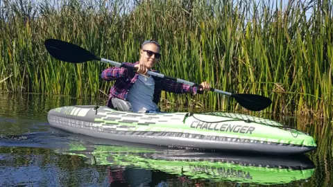 Family handout Jayden Booroff in a kayak