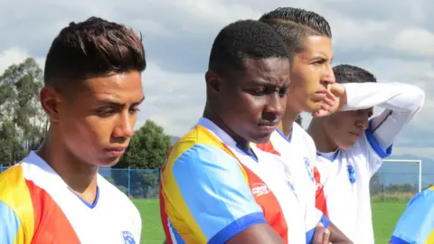 Bryan Sanclemente, Didier Borja, Alejandro Duque and Wilson Salazar concentrating on the pre-match motivation talk given by coach Sebastian Acosta