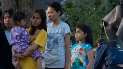 AFP Residents stay in an open field rather than their homes in Palu in Central Sulawesi on 29 September 2018