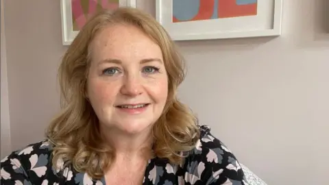 Siobhan McKenna A woman smiling to camera