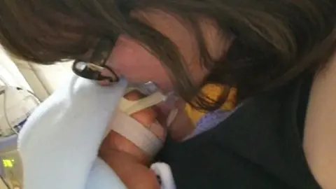 PAMELA HARVEY Pamela Harvey and her son Louis