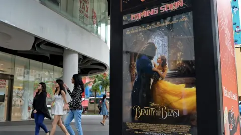 ROSLAN RAHMAN/AFP/Getty Beaty and the Beast poster