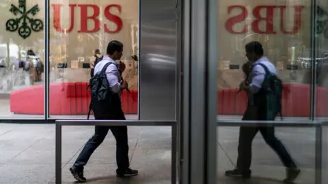 Getty Images A man walks into UBS