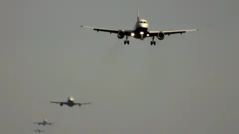 Getty Images Planes in a queue