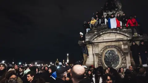 Getty Images Crowds of France fans with flags