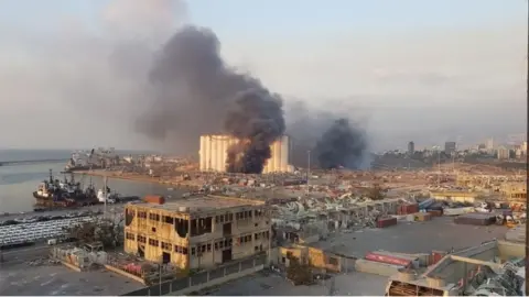 EPA The blast in Beirut's port district, 4 August 2020