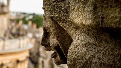 Cliff Kinch "A gargoyle from the viewing gallery of St Mary's Church with the Radcliffe Camera just in the background."