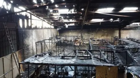 AS Police Damage after a warehouse fire