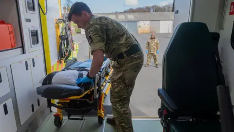 Getty Images/MoD/Cpl Watson The Army in Wales is training 60 soldiers to prepare to support the Welsh Ambulance Service NHS Trust (WAST) in the battle against the novel coronavirus COVID-19. The soldiers, will be taken through a two-day training package delivered by WAST.