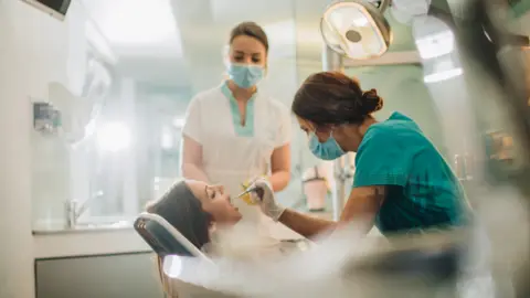 skynesher/Getty Images  Dentist at work