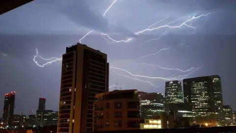 Rich H Rich H's image of storm in Canary Wharf