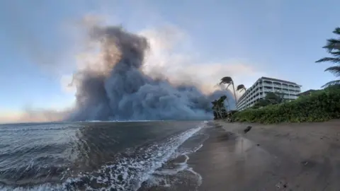 Reuters The fire in Maui and smoke