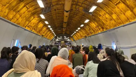 BBC Women sat on an aircraft