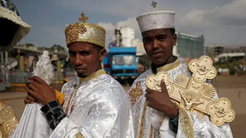 Reuters An Ethiopian Orthodox deacon carries a cross during the Meskel Festival to commemorate the discovery of the true cross on which Jesus Christ was crucified on at the Meskel Square in Addis Ababa, Ethiopia