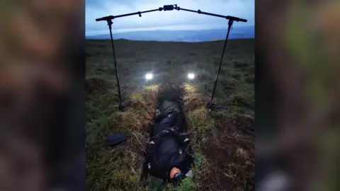 Ashley Calvert Lecturer in a ditch