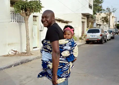 'How I made fathers in Senegal carry babies on their backs'